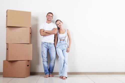 Removal team packing boxes safely in a Barnet home