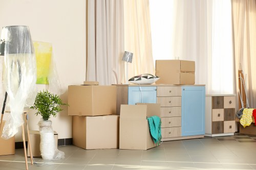 Removal team preparing household items for a UK move