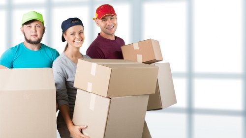 Furniture being moved from a Barnet flat with careful handling