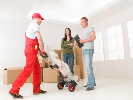Office furniture and equipment being prepared for a Barnet business move