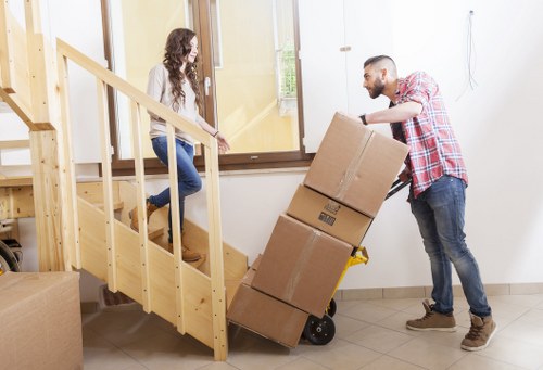 Loading furniture and boxes into a removals van
