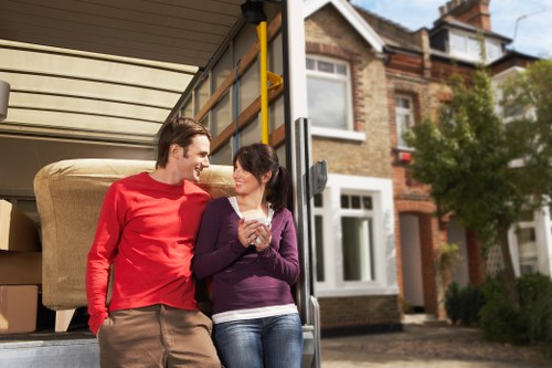 Professional Barnet movers handling furniture with care