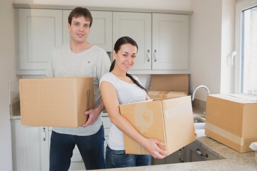 House movers preparing furniture for transport in Barnet